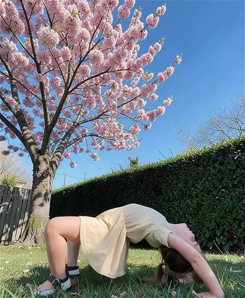 AI Video from prompt: The girl does a perfect backward bend during yog