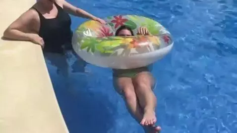 AI Video from prompt: The inner tube inflates to a gigantic size, maki