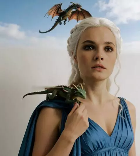 AI Video from prompt: a little dragon hops from a girl,s shoulder onto