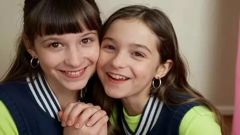 AI Video from prompt: Kissing a twin girl