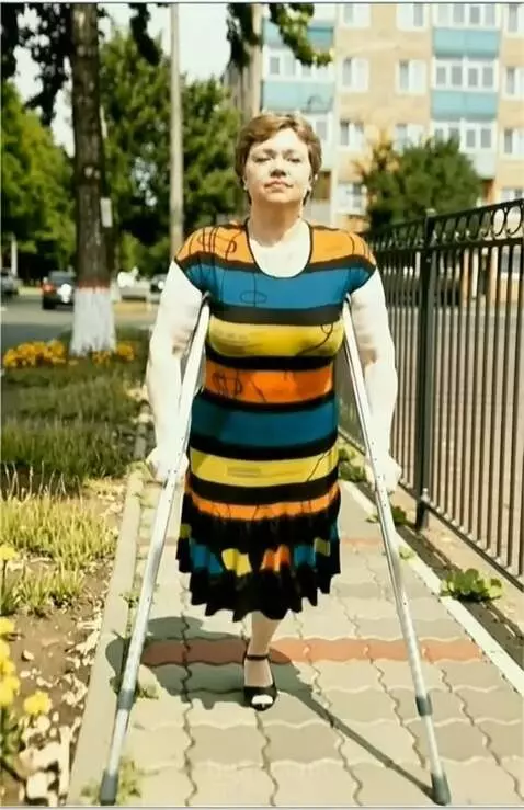 AI Video from prompt: Kling 2.5 Turbo (pro) A one-legged woman walks d