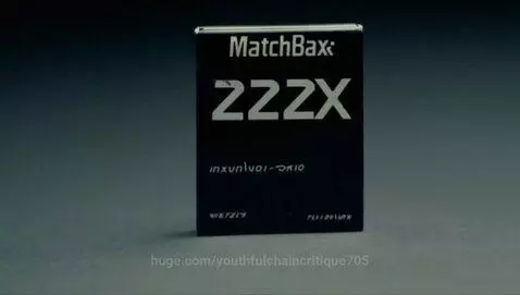 A black rectangular matchbox labeled 'MatchBax' rotates on a dark, textured background with dramatic lighting.