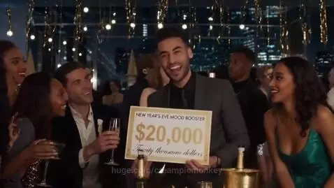Diverse adults celebrating New Year's Eve party, man holds sign 'NEW YEAR'S EVE MOOD BOOSTER $20,000'.