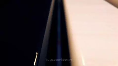 Close-up of wide, majestic piano keys made of polished ebony and ivory, bathed in soft, classical light.