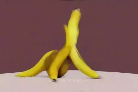 Animated yellow bananas performing dance moves and splits on a stage with a purple background.