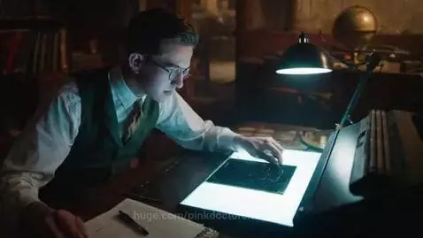 Clyde Tombaugh examining star photographs to discover Pluto.