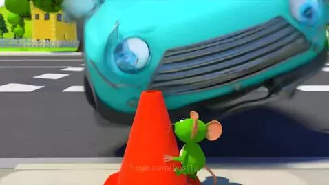 A green cartoon mouse on a traffic cone with a car driving past.