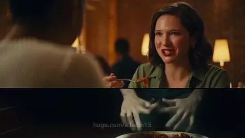 Split screen: Woman's face trying to look normal above table, her desperate hand gestures below table.