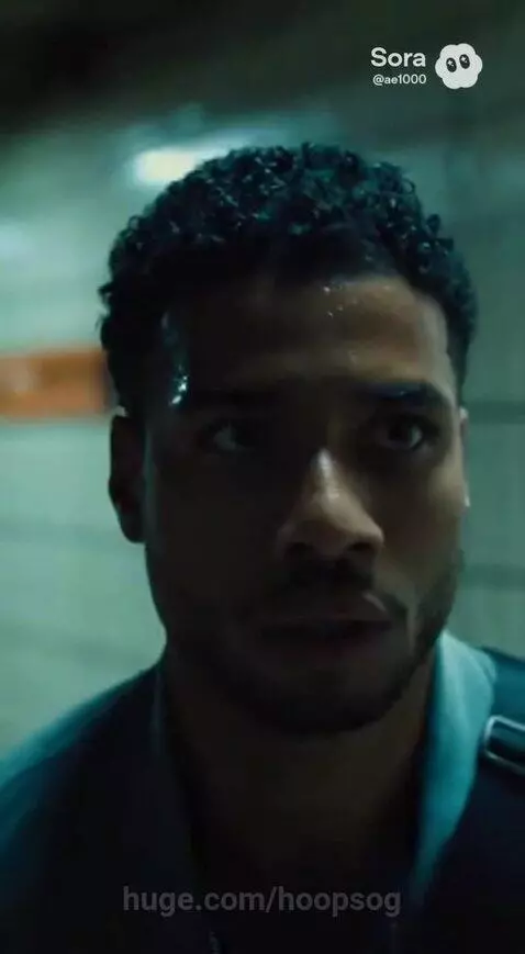 Man disarms attacker in dimly lit corridor, then runs up stairs to a city street.