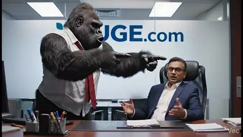A gorilla in a shirt and tie quits his office job, pointing and growling at a stunned man at a desk.