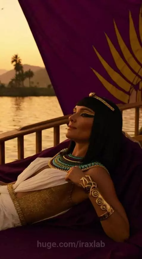 Cleopatra in a golden gown descending a grand staircase, with opulent ancient Egyptian and Roman settings.