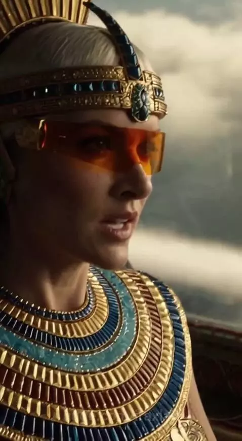 Sleek futuristic aircraft with glowing blue thrusters flying low over water, then ascending through clouds.