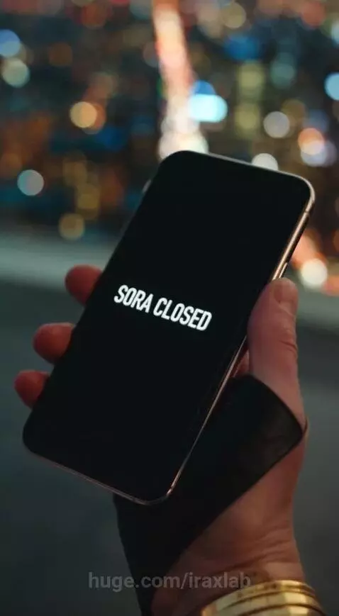 Smartphone displaying 'SORA CLOSED' with a woman and man on a rooftop overlooking a city skyline at night.