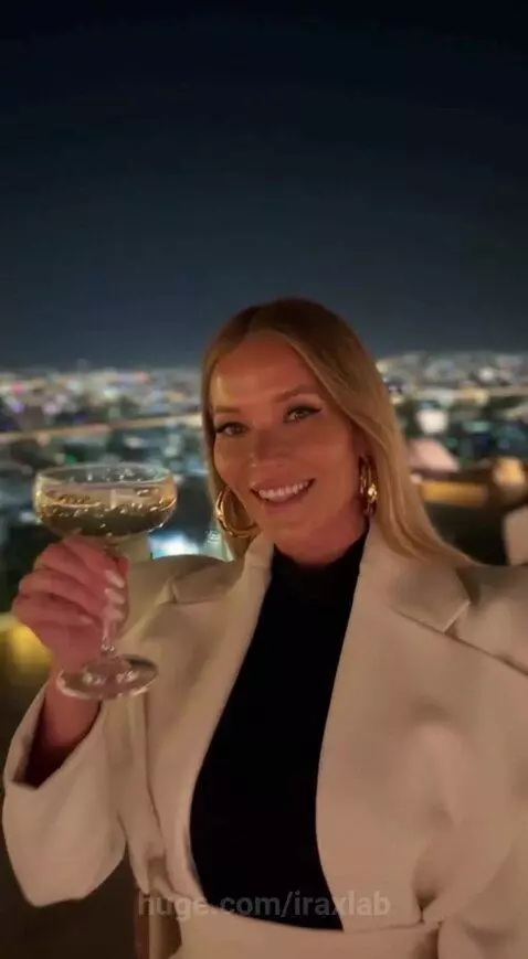 Stylish woman enjoying luxury experiences curated by the Sora app, including sunsets and high fashion.