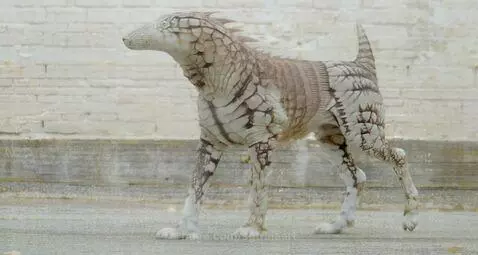 Fantasy alien dog creature with white, brown, and grey scales walking on a paved surface.