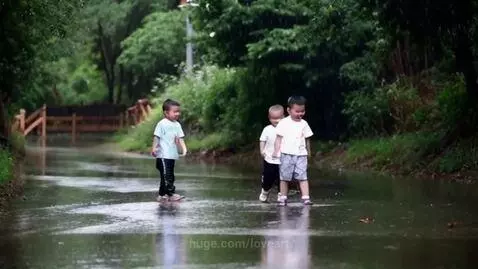 Children playing in the rain by loveart