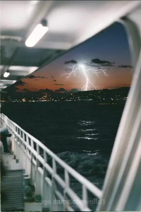 A lightning storm at sea by lonewolfd1