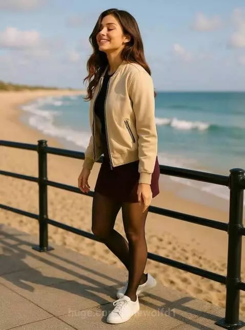 girl at the beach by lonewolfd1