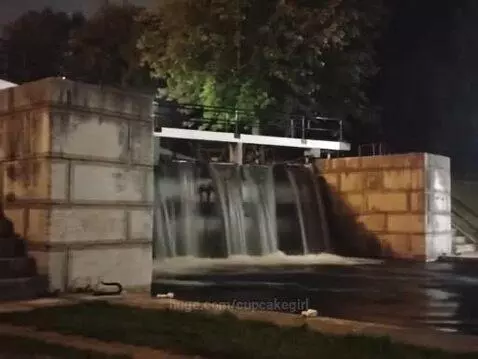 Tranquil flow under the city lights — a peaceful night by th... by cupcakegirl