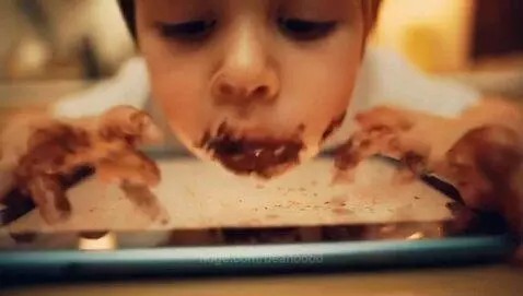 kid playing on greasy ipad by beanoooo