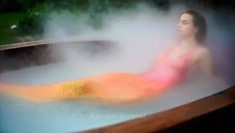 mermaid swimming in a pool by ohnepixel