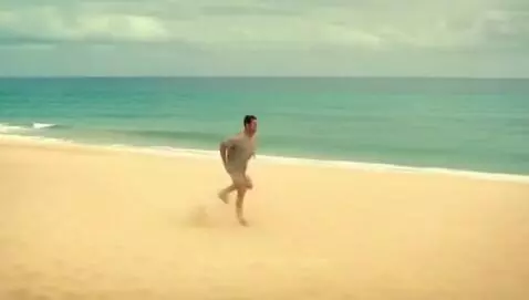 man running on a beach by nipperman