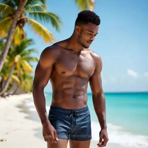 Smiling Black Male Model on a Beach Photoshoot by rescueranjazz