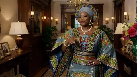A glamorous sexy Nigerian lady wearing native attire casuall... by rescueranjazz
