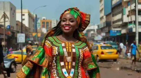 A glamorous sexy Nigerian lady wearing native attire casuall... by rescueranjazz