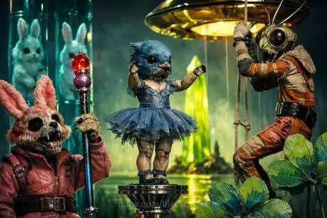 Fantasy scene with a pink fox holding a scepter, a blue doll on a pedestal, and a mantis climbing a ladder under a UFO.