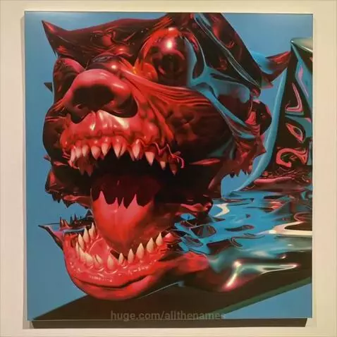 Stylized metallic creature head, red and blue, with multiple eyes and sharp teeth, rotating against a light blue background.