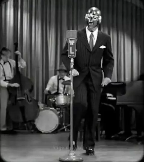 Old 1940’s tv clip of humanoid tap dancing and singing by blurai