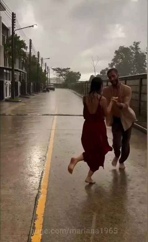 we dance, we dance, through the rain by mariana1965