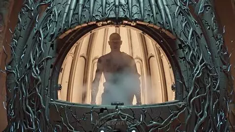 A tattooed monk with metallic arm enhancements emerges from a dark, biomechanical structure resembling a cathedral organ.