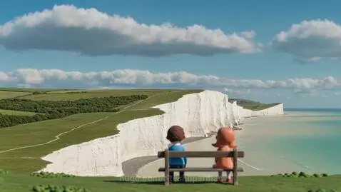 Two clay figures at the scenic Seven Sisters cliffs🎬 by riteshhparihar