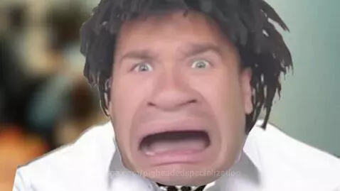 Man with dreadlocks looking distressed as another man takes slices of pizza.