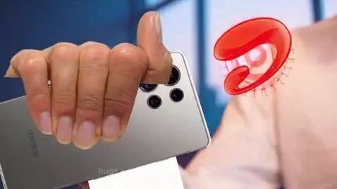 Man with tongs reacts in fear to a smartphone 'zapping' a cartoon ghost outside a window.