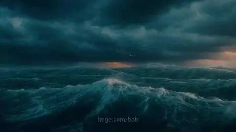 A dark, stormy sky over a turbulent ocean with large waves crashing and a sliver of light on the horizon.