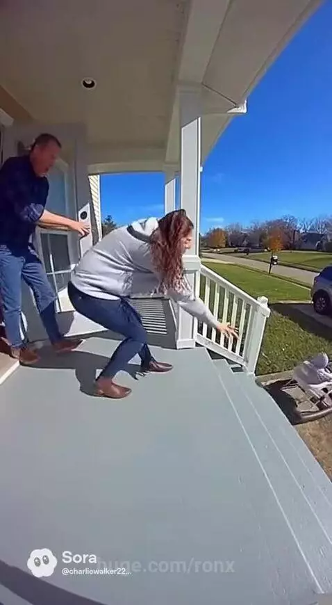 Mom lunges to catch a baby in a walker just before it rolls down porch steps.