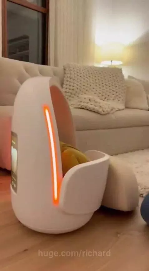 A crying baby in a futuristic white bassinet with orange light, being soothed by sleep assistance technology.