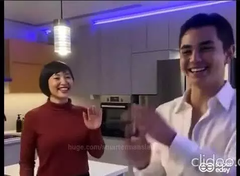 Couple participating in a TikTok trend, showing contrasting 'black and white love' with playful effects.