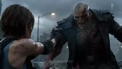 Jill Valentine in tactical gear fighting a mutated creature, Nemesis, in a destroyed city street.