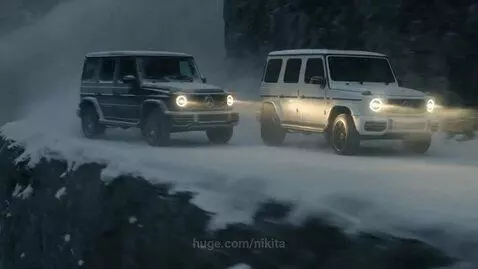 Two Mercedes-Benz G-Wagons driving aggressively on a snowy, winding mountain road, one kicking up snow.