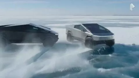Two Tesla Cybertrucks drifting and colliding on a frozen, icy surface with water splashing.