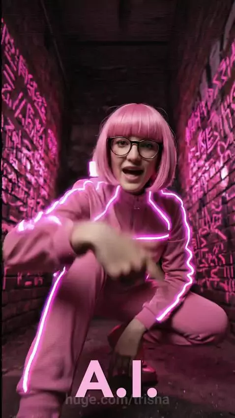 Woman with pink hair and glasses in neon pink outfits performing energetic dance moves in stylized environments.