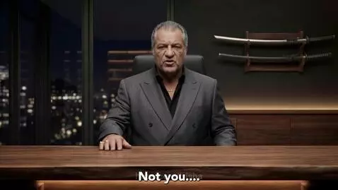 Vigilante in a shiny pink suit crouching on a rooftop overlooking a city at night.