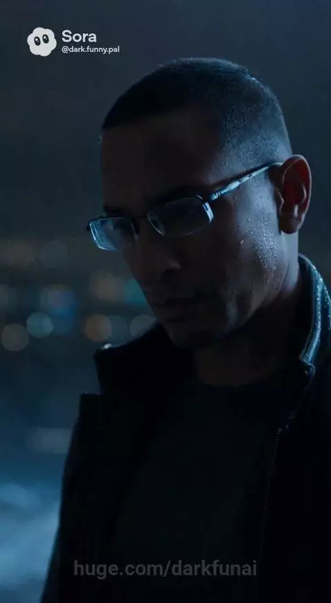 Close-up of a distressed woman with a bloody, injured eye, and a man tending to her wound.