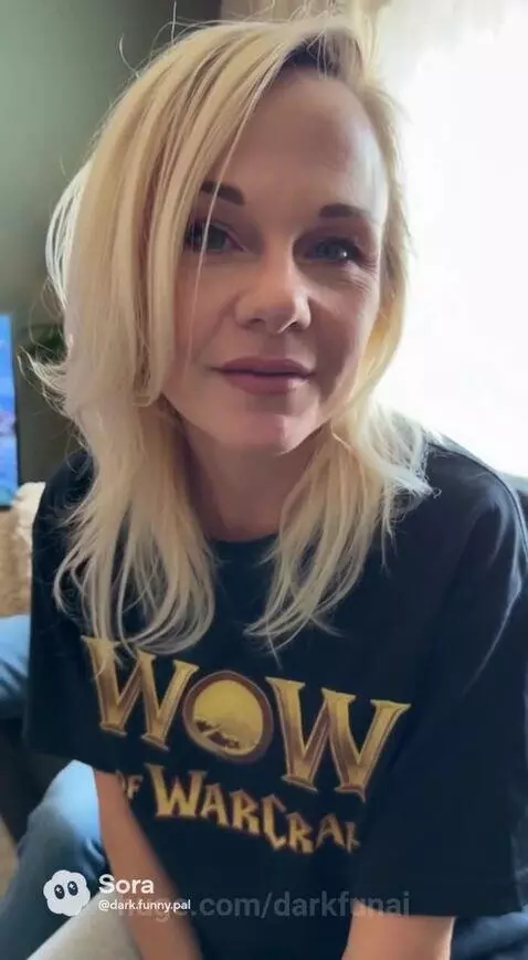 Couple on couch, woman asks man if he'd trade her for a newer model, man responds humorously.