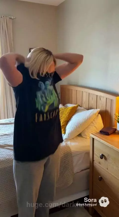 Woman performing morning routine, looking confused at her reflection after hearing husband's sleep talk.