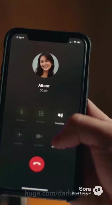 Man in a long coat walks through an industrial facility, serious expression, after discussing a critical sci-fi threat on the phone.